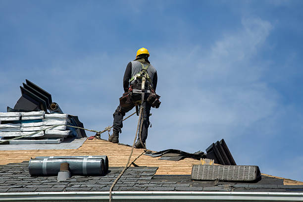 Professional Roofing technician working in Kensington, MD